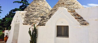 Trulli in historic farmhouse in panoramic position between sea and hills