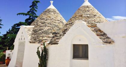 Trulli in historic farmhouse in panoramic position between sea and hills