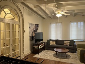 Smart TV, fireplace, foosball, books