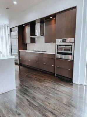 Microwave, cookware/dishes/utensils, dining tables