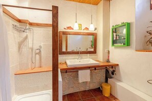 Shower, hair dryer, towels, soap - Room with private bathroom and living room in a rural house (Costean)