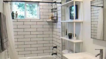 Hair dryer, towels, soap, shampoo