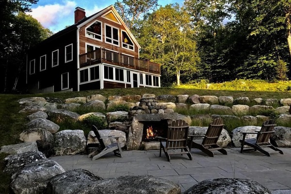 House with outdoor firepit