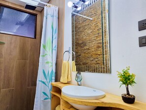 Exclusive Studio, 1 Queen Bed, Kitchen | Bathroom | Shower, free toiletries, hair dryer, towels