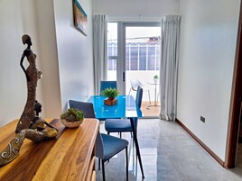 Superior Studio, 1 King Bed, Kitchenette | Living area | 52-inch Smart TV with cable channels, TV, Netflix