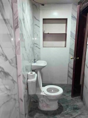 Shower, towels, soap, shampoo