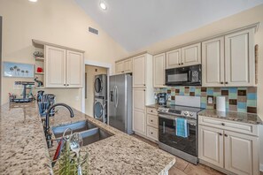 Fridge, microwave, dishwasher, cookware/dishes/utensils