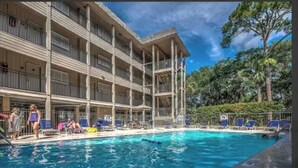 A multi-story hotel with a pool area. - 3rd Floor 100% Remodeled Condo- Ocean Views (Hilton Head Island)