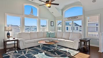 Flat-screen TV, fireplace, table football