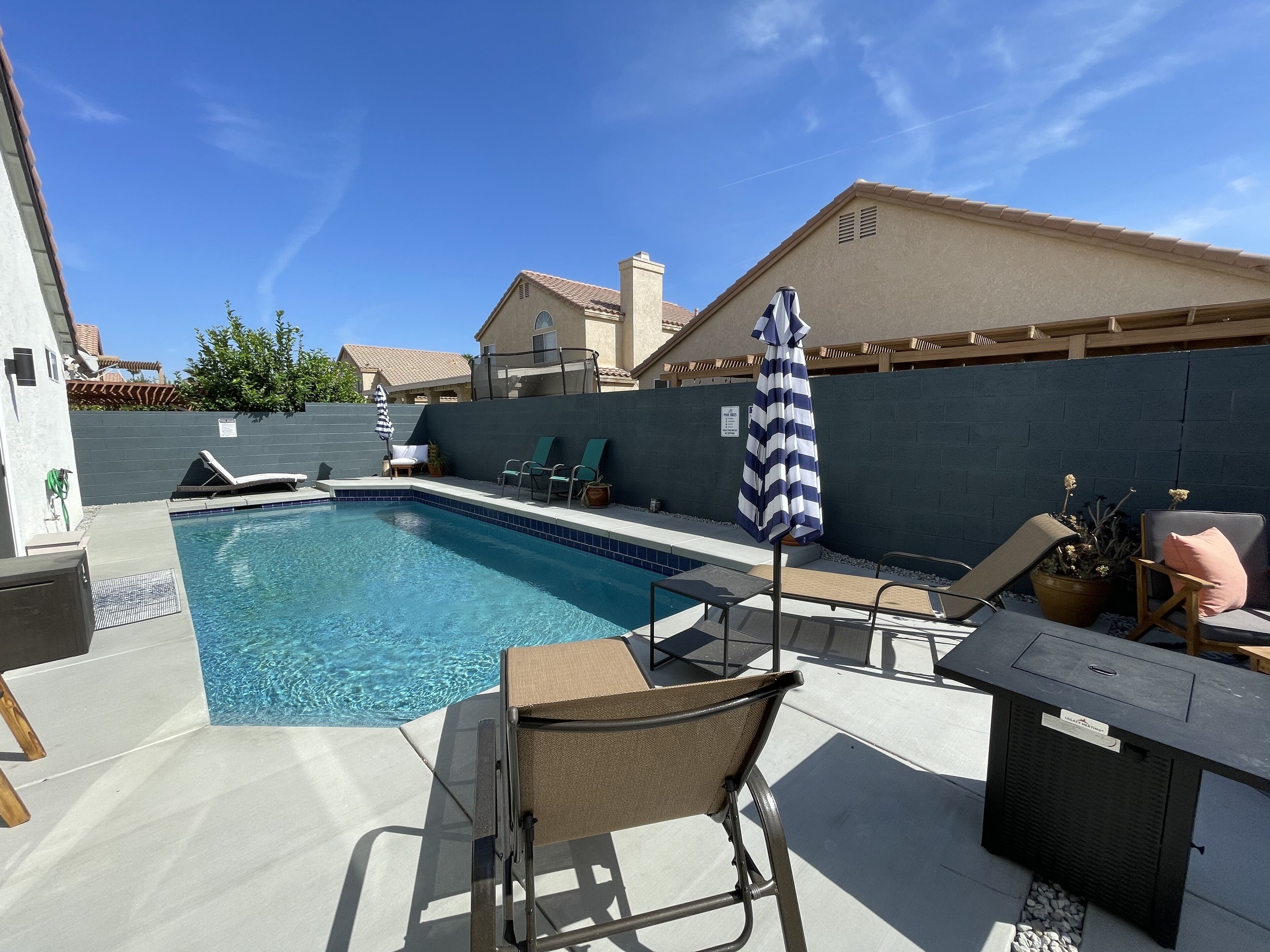 Newly updated House saltwater pool, putting green and outdoor fireplace and bbq.