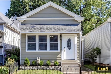 Exterior. Renovated 100-Year-Old Shotgun Home-- Modern Comfort Meets Local Character!
