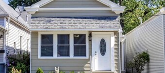 Renovated 100-Year-Old Shotgun Home-- Modern Comfort Meets Local Character!