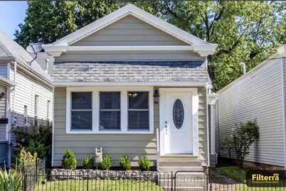 Renovated 100-Year-Old Shotgun Home-- Modern Comfort Meets Local Character!