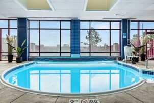 Indoor pool, outdoor pool, open 8:00 AM to midnight, pool loungers