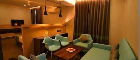 Signature Double or Twin Room, 1 Bedroom, Non Smoking, City View | Living area | Fireplace, printers