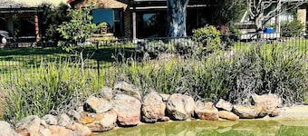 A rural retreat on 15 acres with swimming pool and direct river access.
