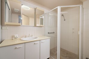 Shower, towels, soap, shampoo