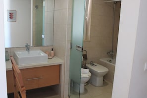 Bañera, secador de pelo