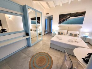 Deluxe Quadruple Room | Premium bedding, down comforters, memory foam beds, minibar - Oasi Blu Sardinia (Pula)