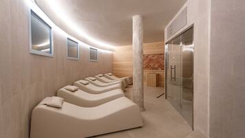 Um spa moderno com várias cadeiras de massagem, um elevador de vidro e uma parede de tijolos.