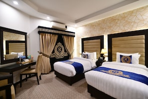 Deluxe Twin Room, 1 Bedroom, Non Smoking | Premium bedding, minibar, desk, laptop workspace - Royal Regency Hotel (Islamabad)