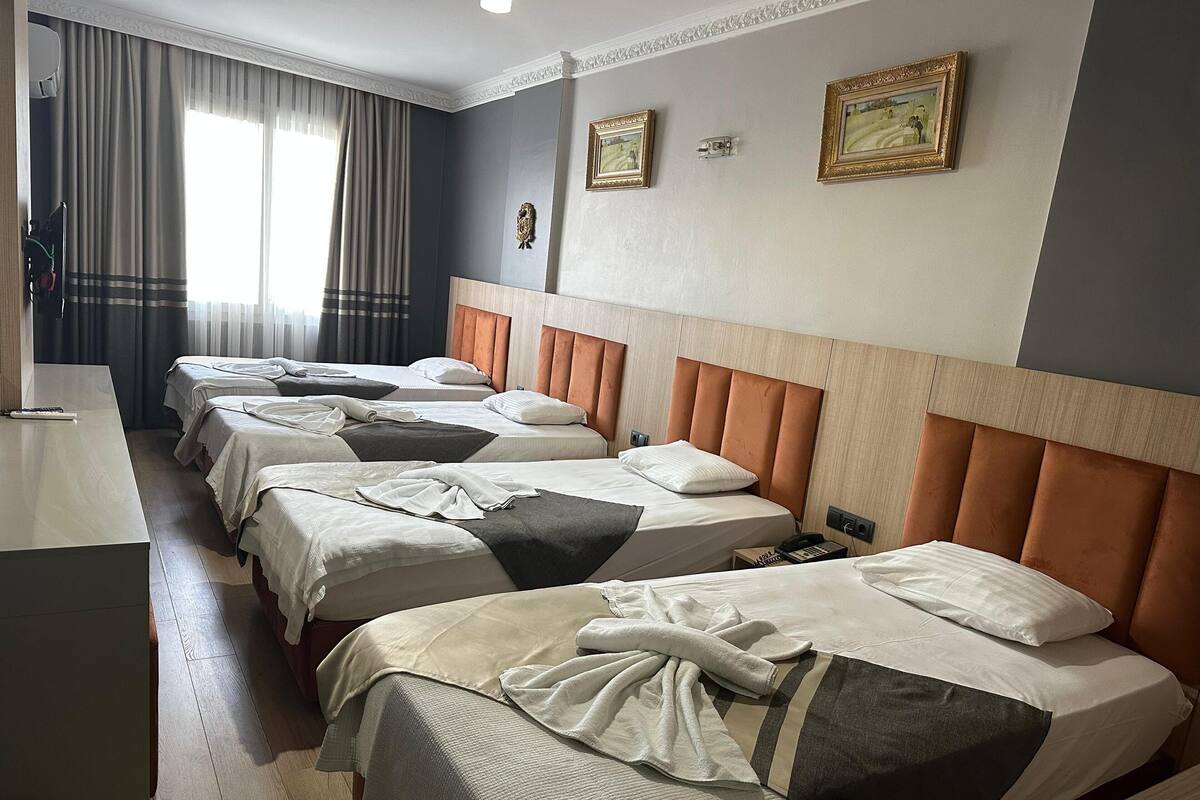 Quadruple Room | Bed sheets