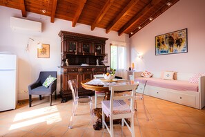 Elite Apartment, 1 Bedroom | Living area | 32-inch LED TV with digital channels, Netflix, streaming services