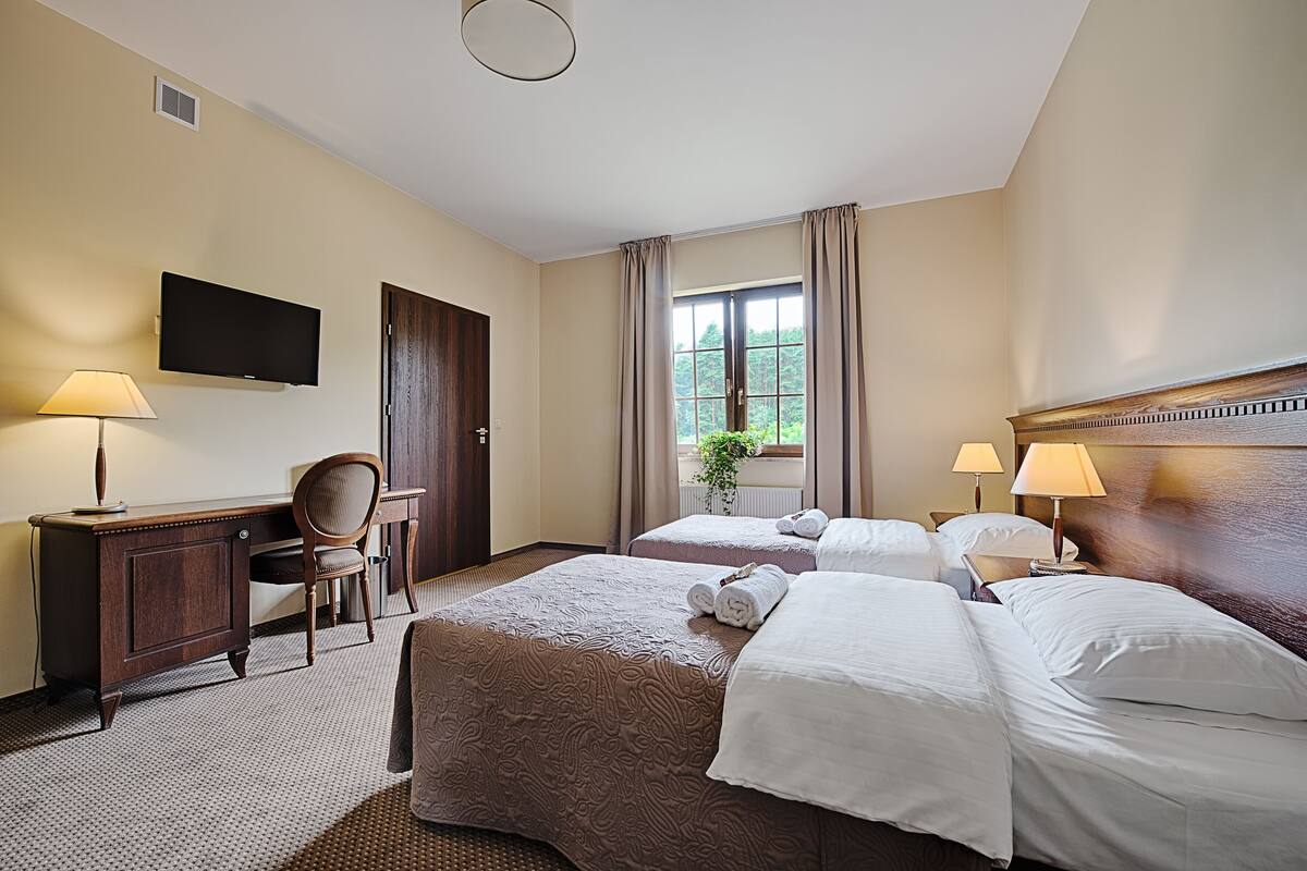 Standard Double or Twin Room | In-room safe, desk, blackout drapes, iron/ironing board