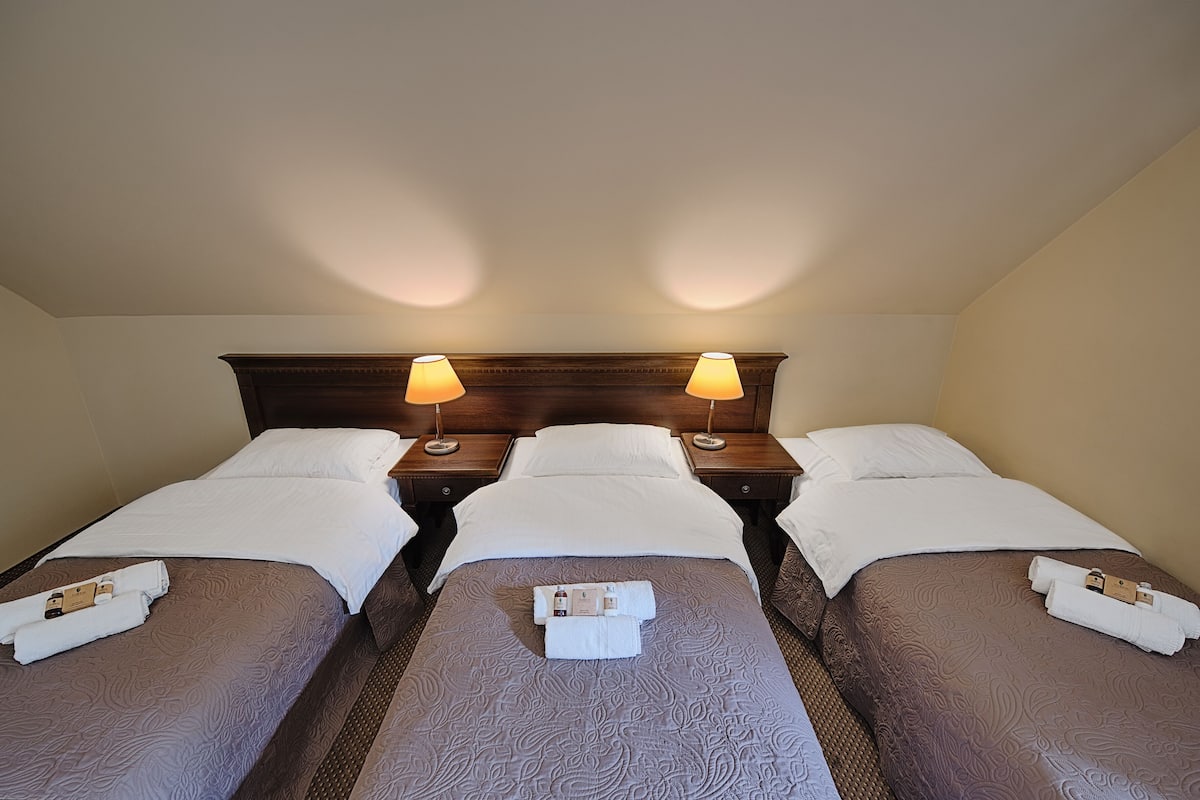 Comfort Quadruple Room | In-room safe, desk, blackout drapes, iron/ironing board