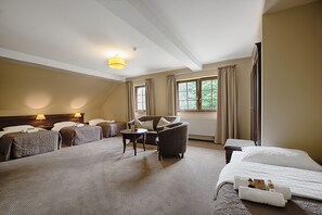Superior Quadruple Room | 1 bedroom, in-room safe, desk, blackout drapes