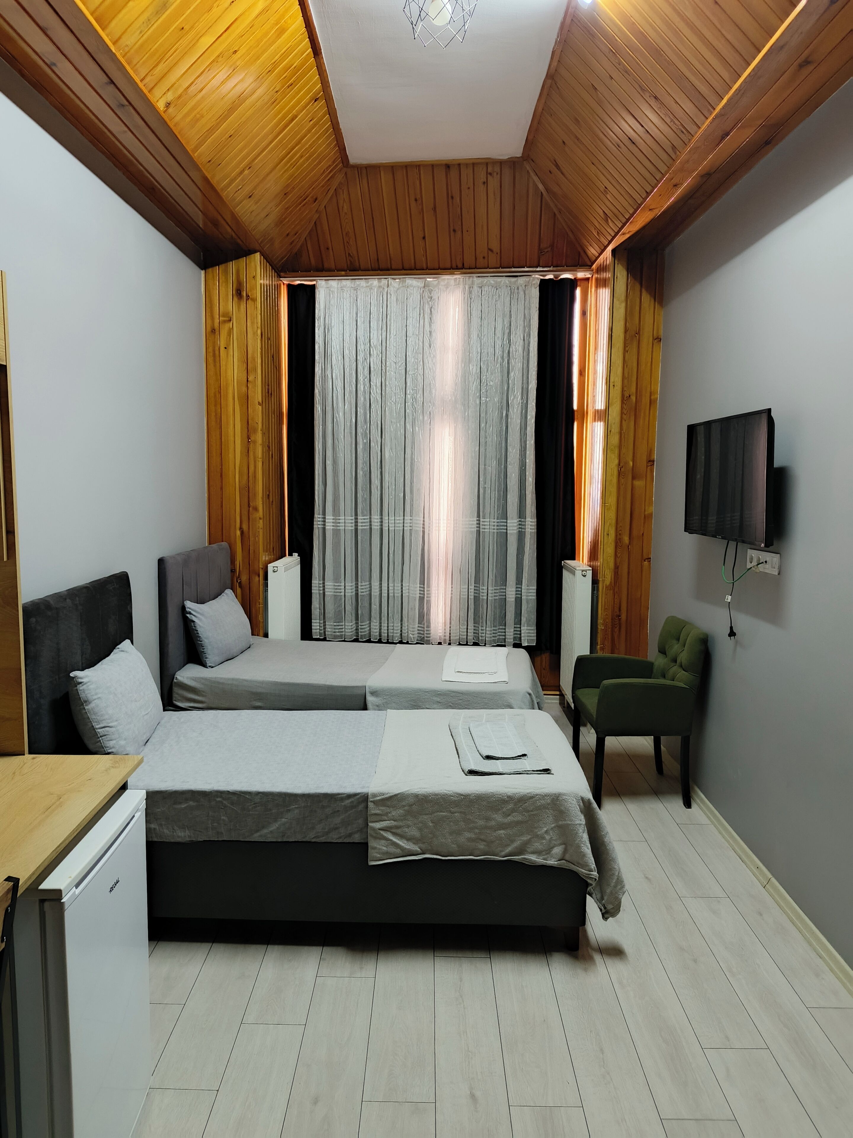 Premium bedding, down comforters, desk, laptop workspace