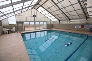 Indoor pool - Fun in the sun at this Cherry Grove Condo! Vacant weeks are discounted! (North Myrtle Beach)