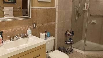 Shower, hair dryer, towels, soap