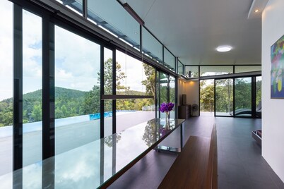 Swimming pool along the terrace, panoramic view surrounded by nature