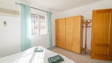 2 dormitorios, tabla de planchar con plancha, wifi gratis y ropa de cama