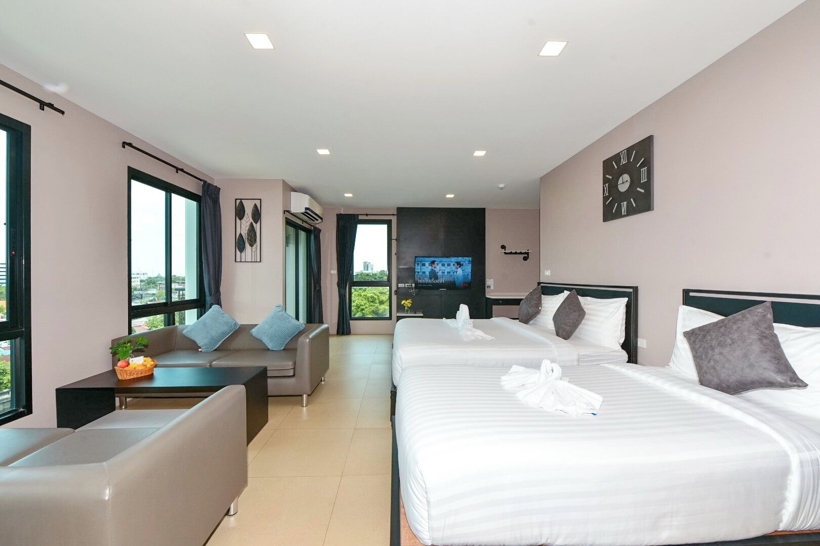 Family Room | Premium bedding, down comforters, desk, laptop workspace