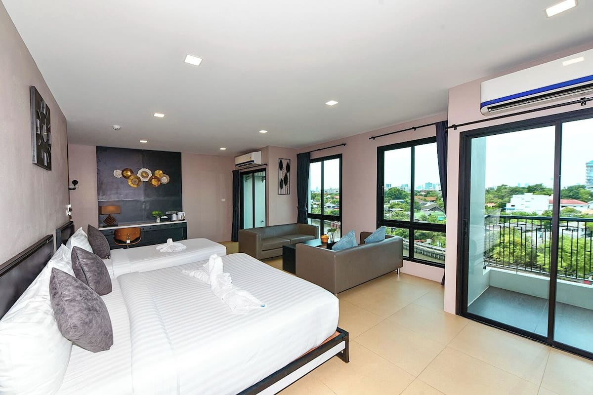 Family Room | Premium bedding, down duvets, desk, laptop workspace