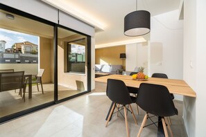 Grand Apartment | Living area | 55-inch Smart TV with cable channels, TV, toys