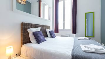 1 chambre, fer et planche à repasser, draps fournis