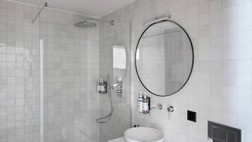 Shower, designer toiletries, hair dryer, towels
