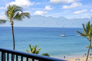On the beach, sun loungers, beach towels