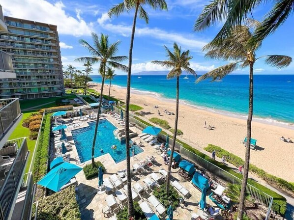 On the beach, sun loungers, beach towels