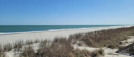 On the beach, sun loungers, beach towels