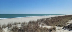 On the beach, sun-loungers, beach towels