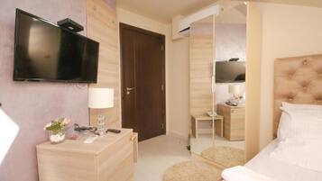 Habitación individual estándar | Cortinas blackout, insonorización y tabla de planchar con plancha