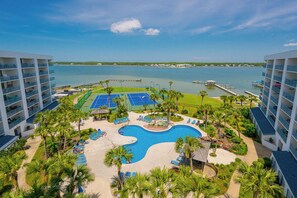 A resort with a swimming pool, tennis courts, and a view of the water. - Gulf Shores Surf and Racquet Club 702B (Gulf Shores)