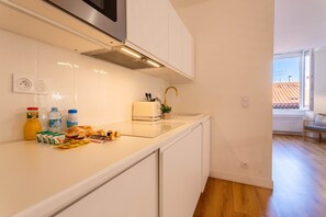 Fridge, microwave, coffee/tea maker, electric kettle