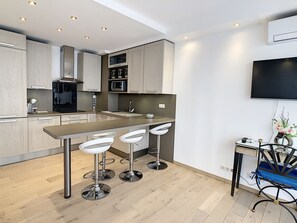 Fridge, microwave, dishwasher, coffee/tea maker