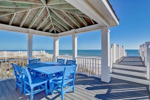 Outdoor dining - Rejuvenate! Full 4Plex Oceanfront Rental w/ Views | Pool | 4 Hot Tubs | Elevator (North Topsail Beach)