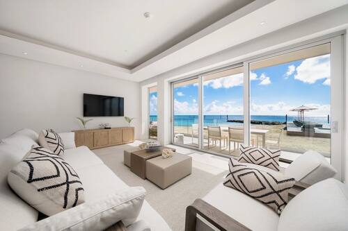 Luxury Condo, Beach View | Living area | 65-inch Smart TV with cable channels, TV, Netflix